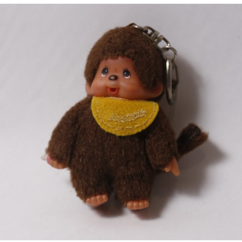 70s Sekiguchi Japan Monchhichi Brown Plush Keychain w Yellow Bib